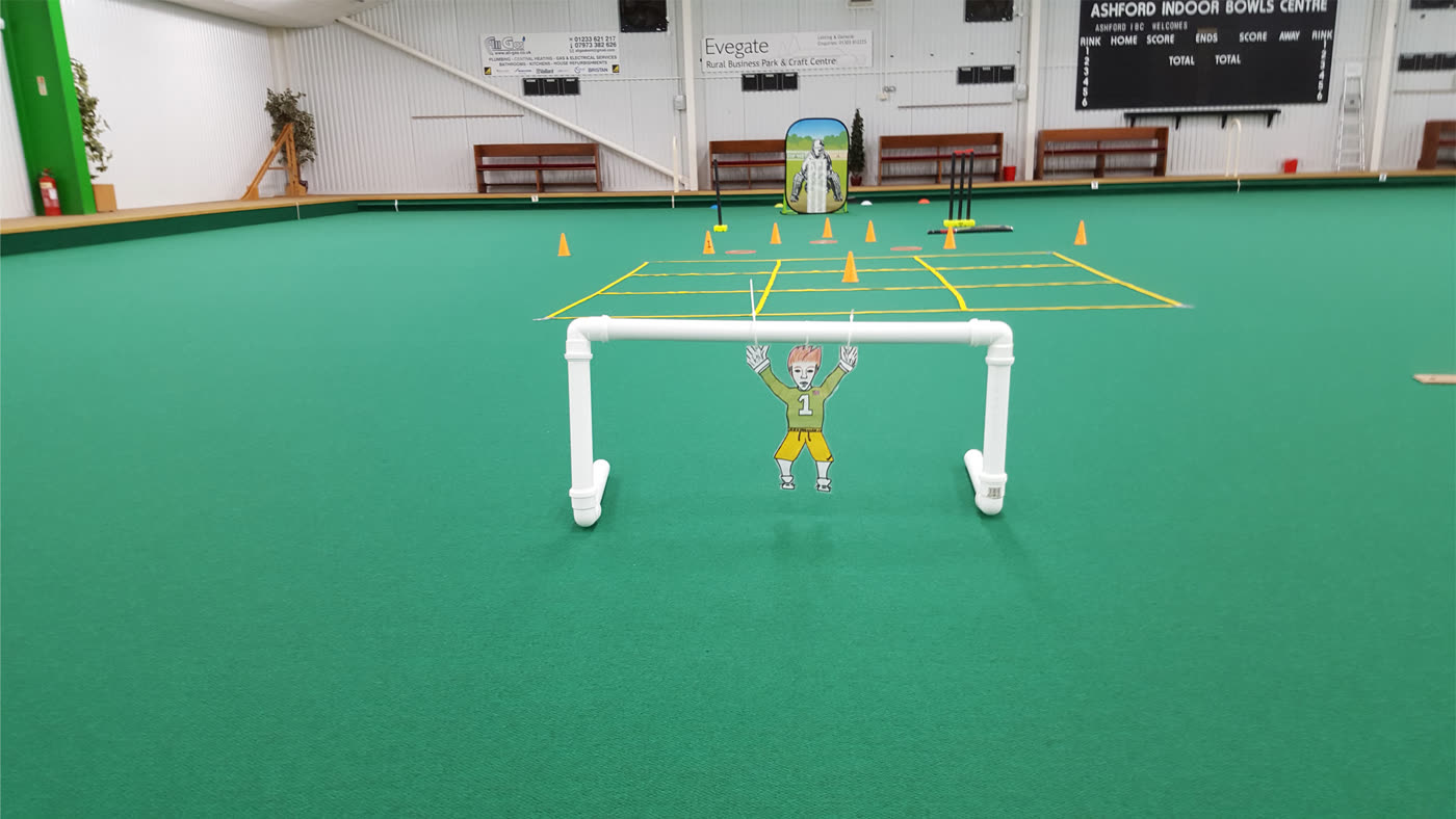 An indoor rink set up with coaching aids
